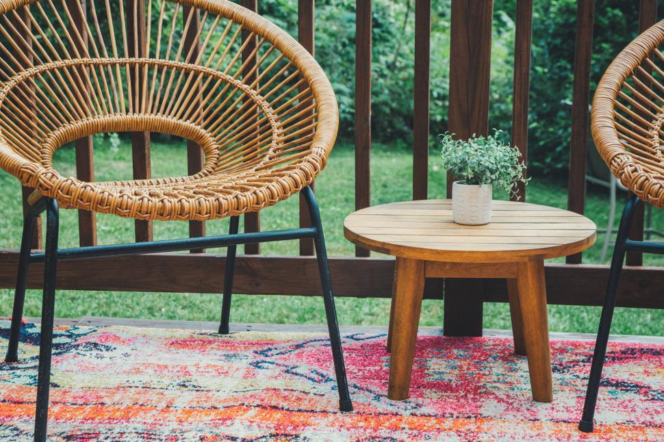 outdoor-patio-with-wicker-chairs-and-small-table