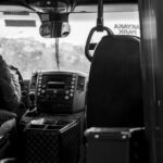Een buschauffeur onderweg in Rijswijk, klaar om passagiers veilig te vervoeren met een moderne bus.
